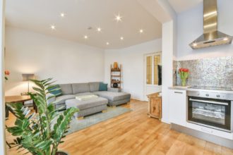 Comfortable living room furniture against window