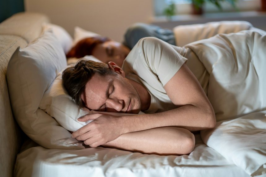 Man and woman sleep soundly well. Importance of long, healthy sleep. Joint sleep of spouses